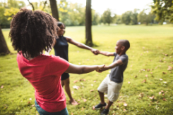 Children holding hands in a circle